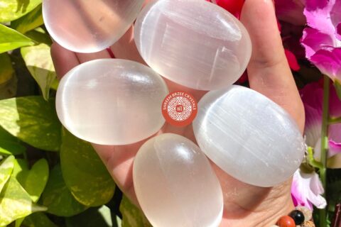 selenite-palm-stones