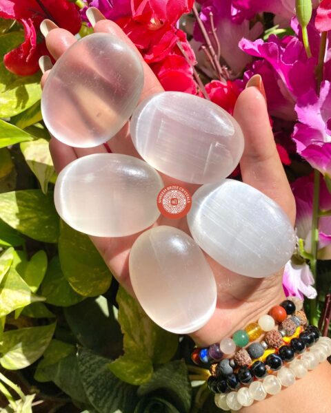 selenite-palm-stones